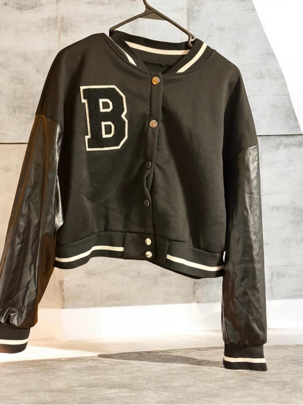 Black Varsity-Style Jacket with Contrast Trim